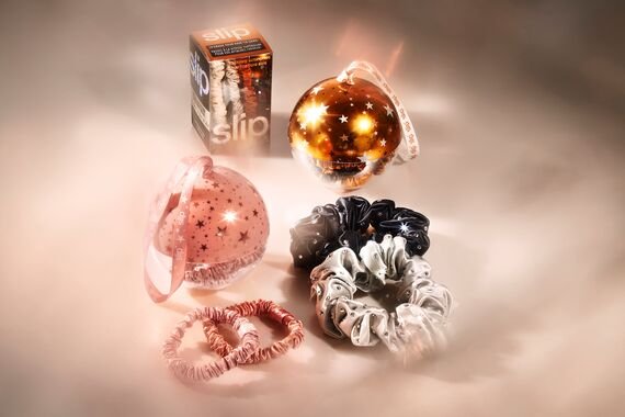 a selection of slip scrunchies and baubles