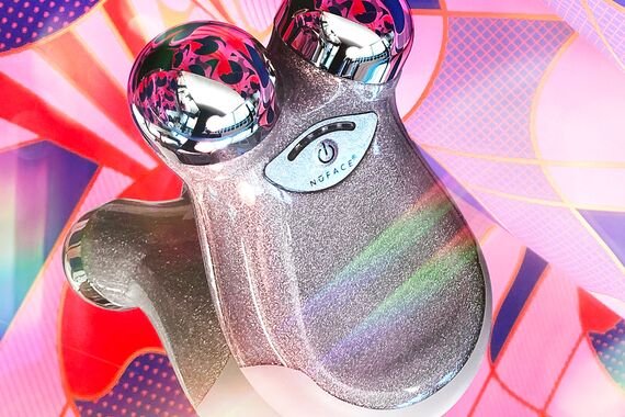 glittery nuface device against pink background