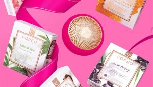 foreo products against a pink background