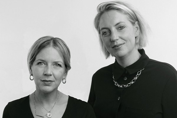 Founders of The Seated Queen in black and white in a studio setting