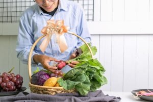 Man with shopping basket filled with superfoods 