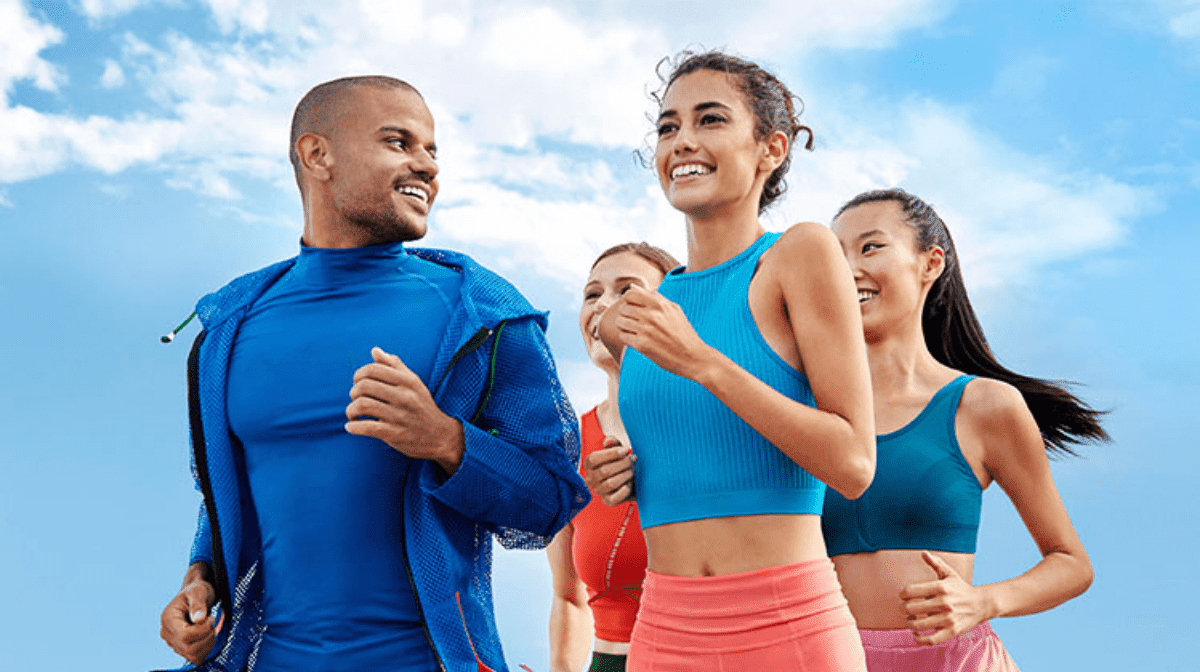 Four young people on a run.