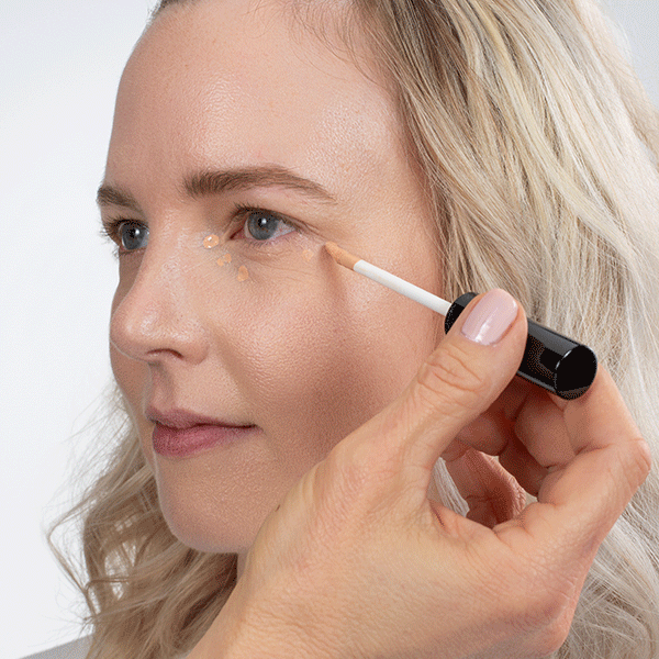 Dab on concealer using the wand, then blend with a concealer brush.