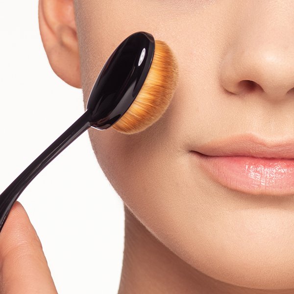 Apply foundation with an oval foundation brush