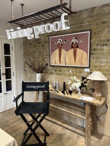An image of a dressing table set up for Living Proof and LOOKFANTASTIC