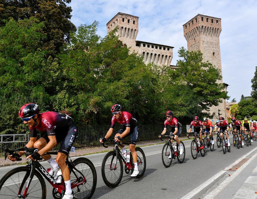 Team Ineos riding bikes with rim brakes