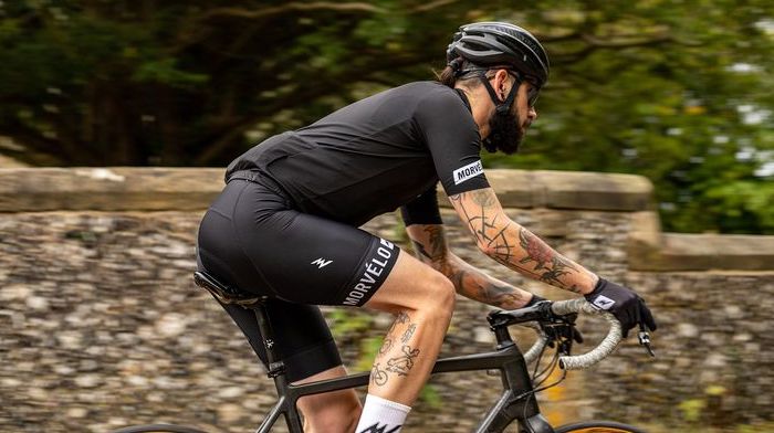 A side shot of cyclist in Morvelo bib shorts