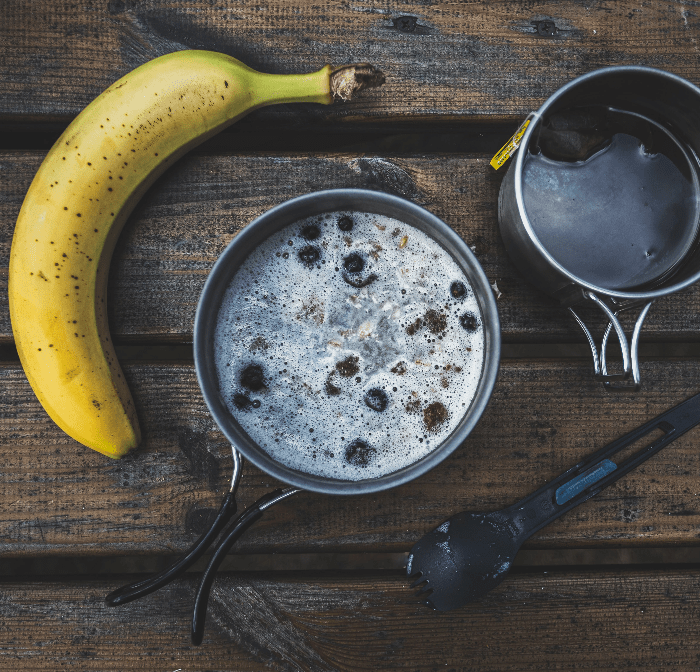 breakfast of banana, porridge, and coffee