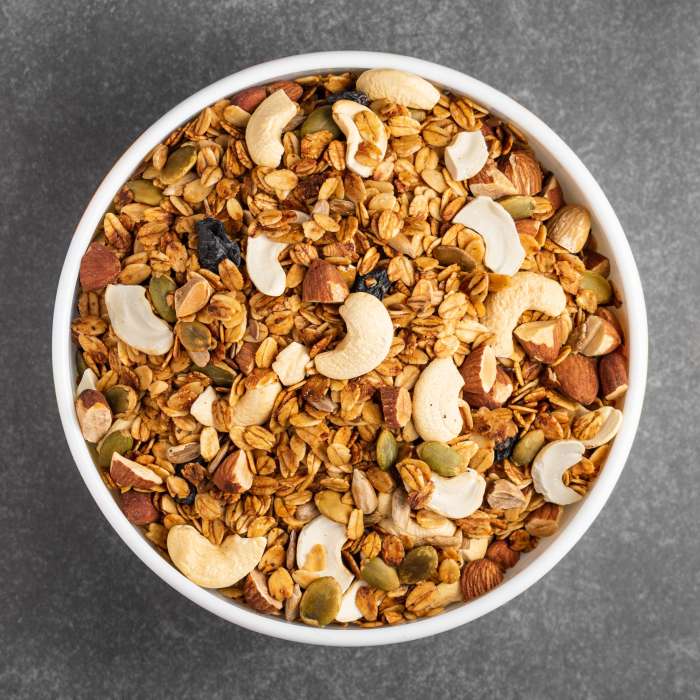 A nutty bowl of cereal shown from above