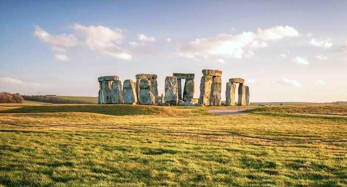 stone henge, surrounded by grass on King Alfred's Way bike packing route