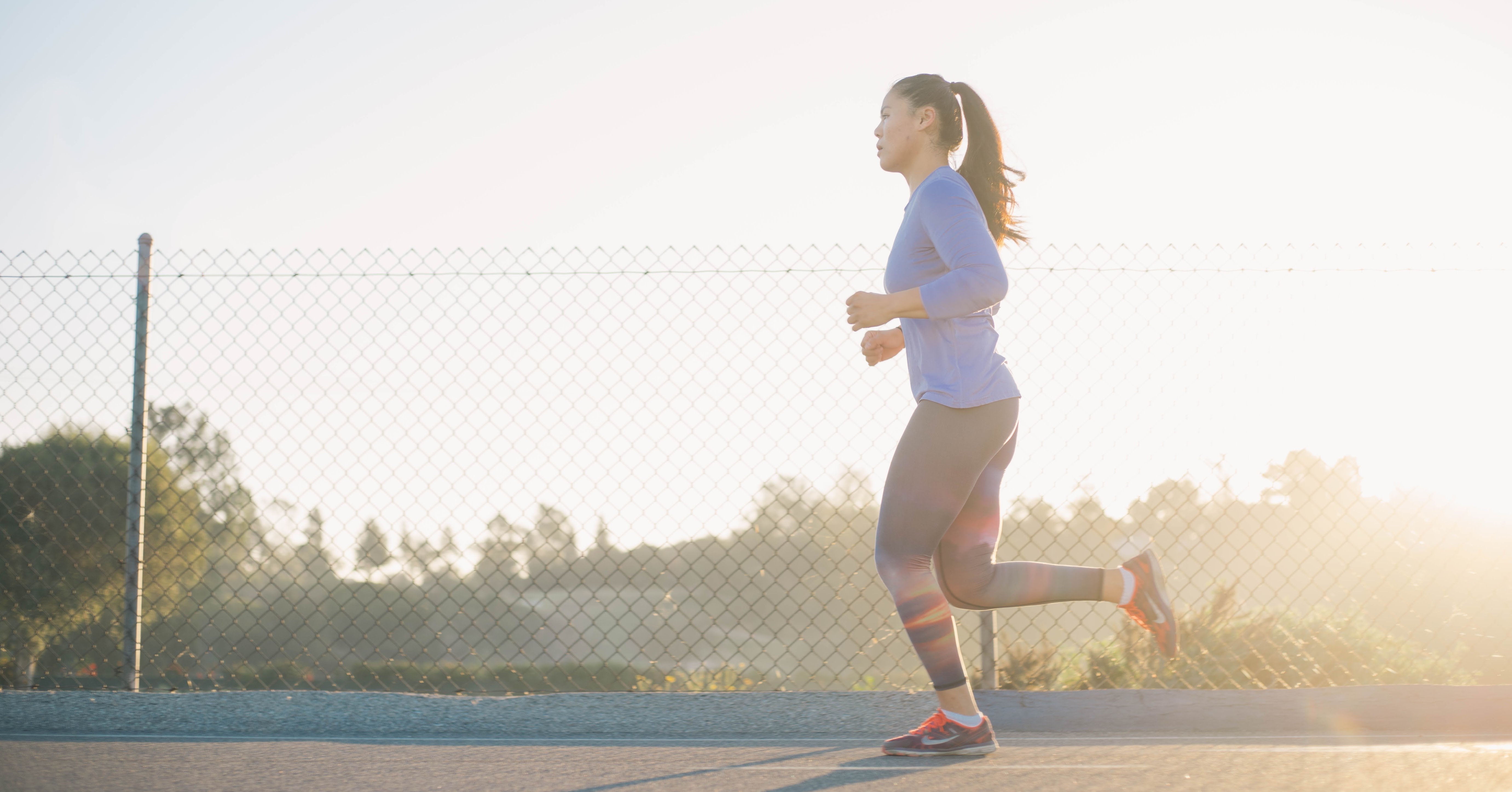 Woman improving her running performance