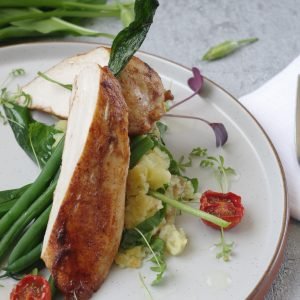 Spring lemon salt n’ pepper chicken breast with crushed wild garlic new potatoes and green beans
