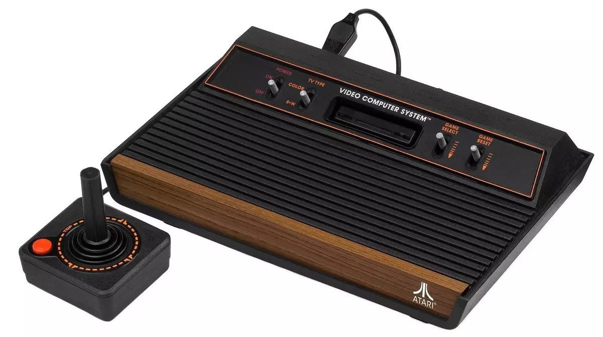 Black Atari video game console with a joystick 