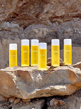 ESPA body oils on a rock