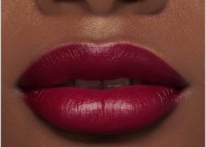 woman wearing dark berry lipstick