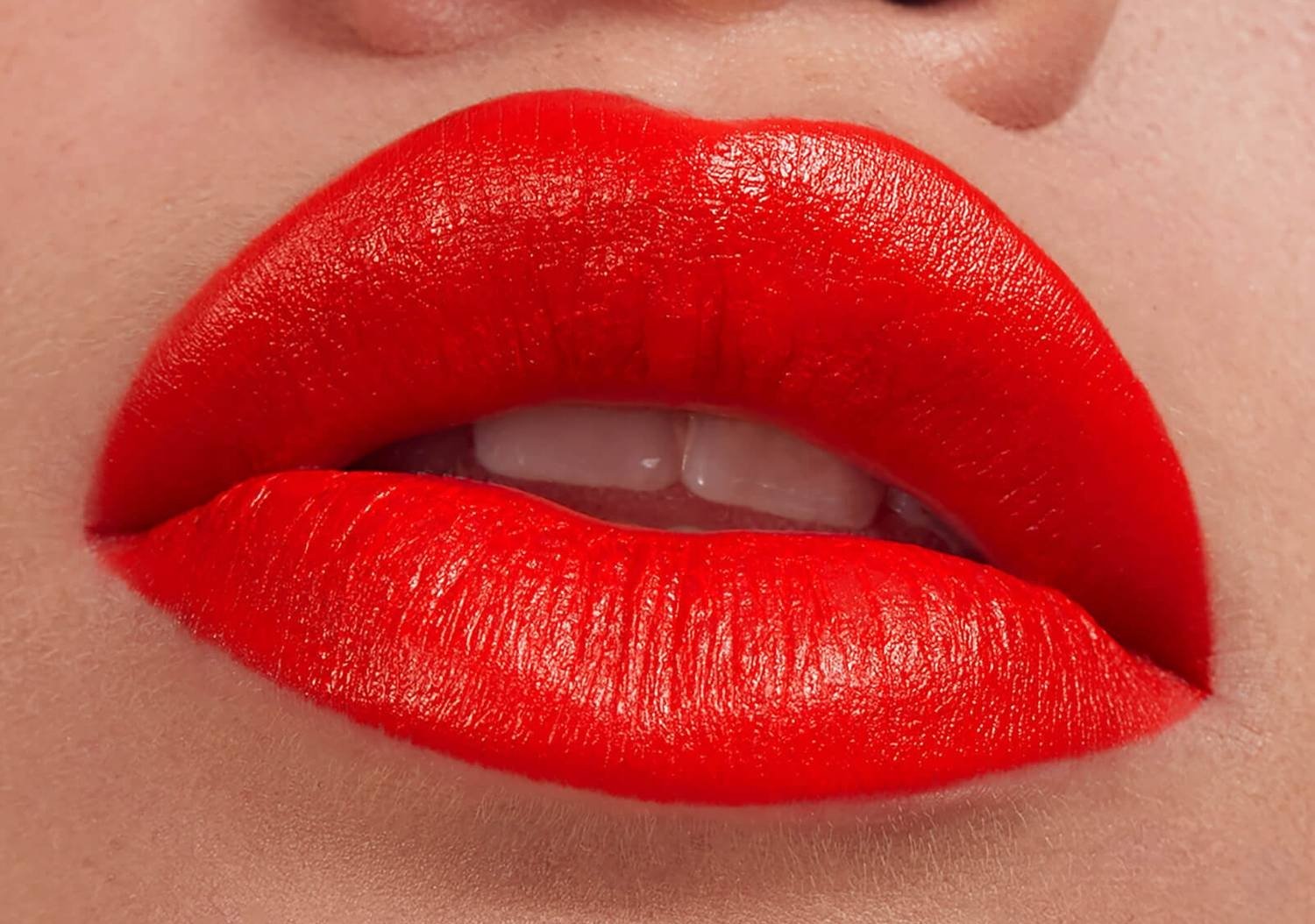 woman wearing orange red lipstick