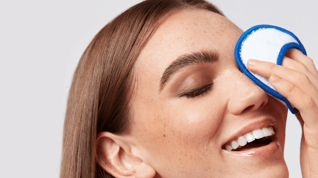 Woman using Off In A Blink Eye Makeup Remover on Bamboo Cotton Pad