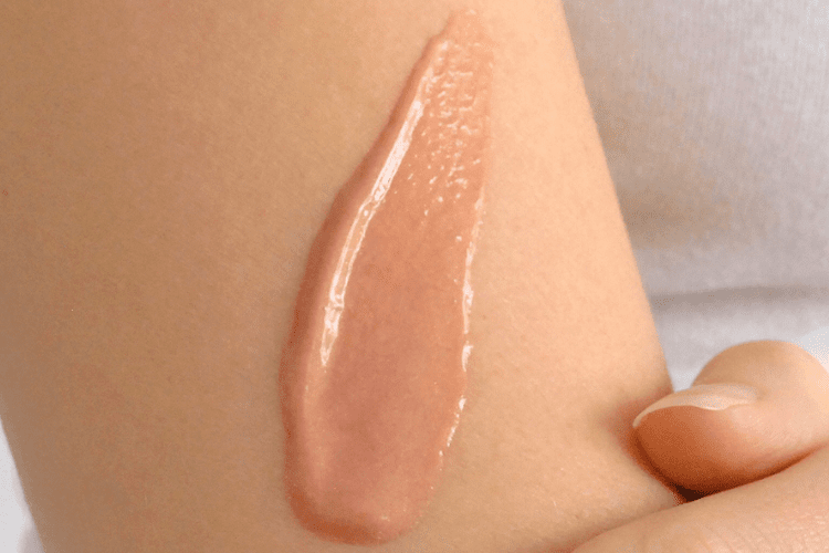 ameliorate transforming body lotion illuminating glow swatch on hand