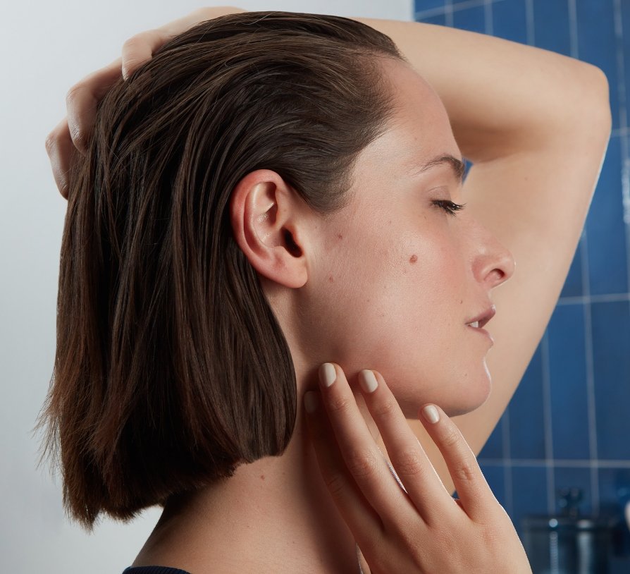 woman touching clean hair