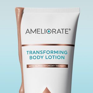 A product shot of Illuminating Glow Transforming Body Lotion against a blue gradient background. The lotion is dripping down the side of the bottle.