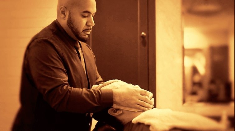 man enjoying a shave