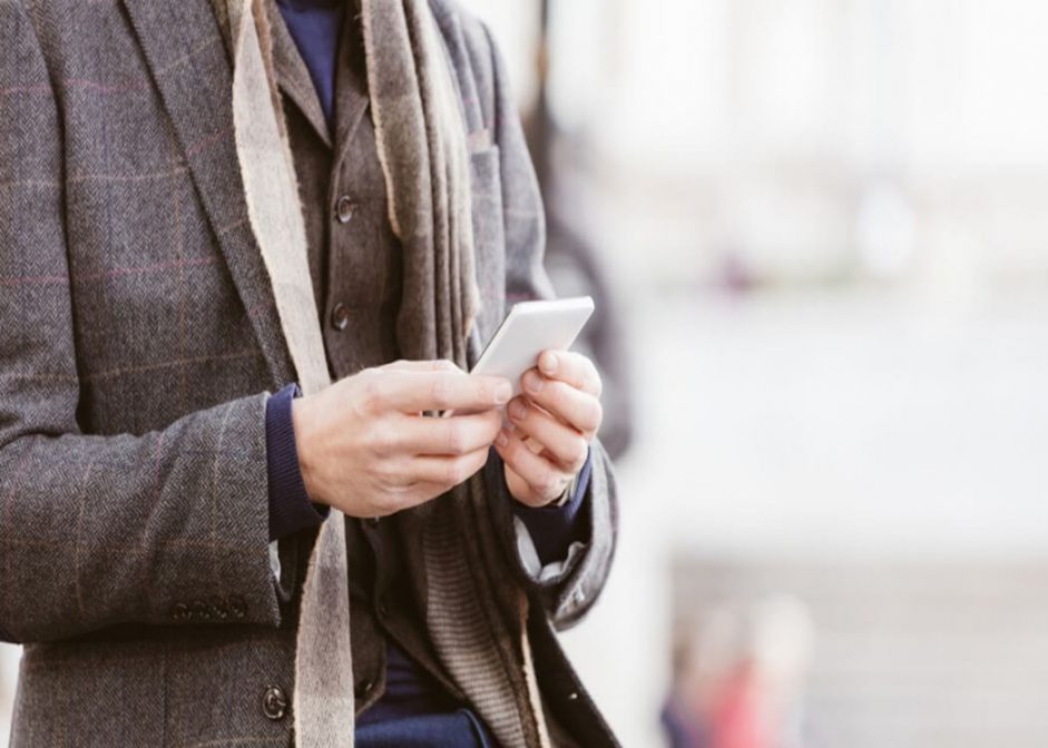 man wearing layers of tweed, wool and cotton