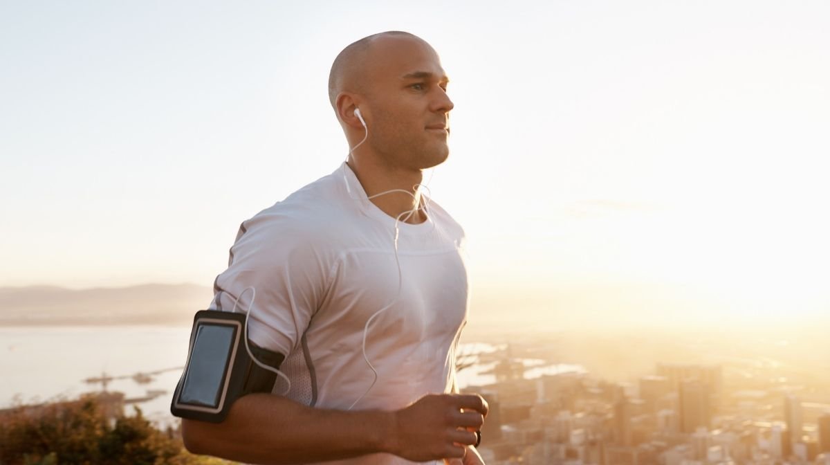 man with shaved head to cover receding hairline