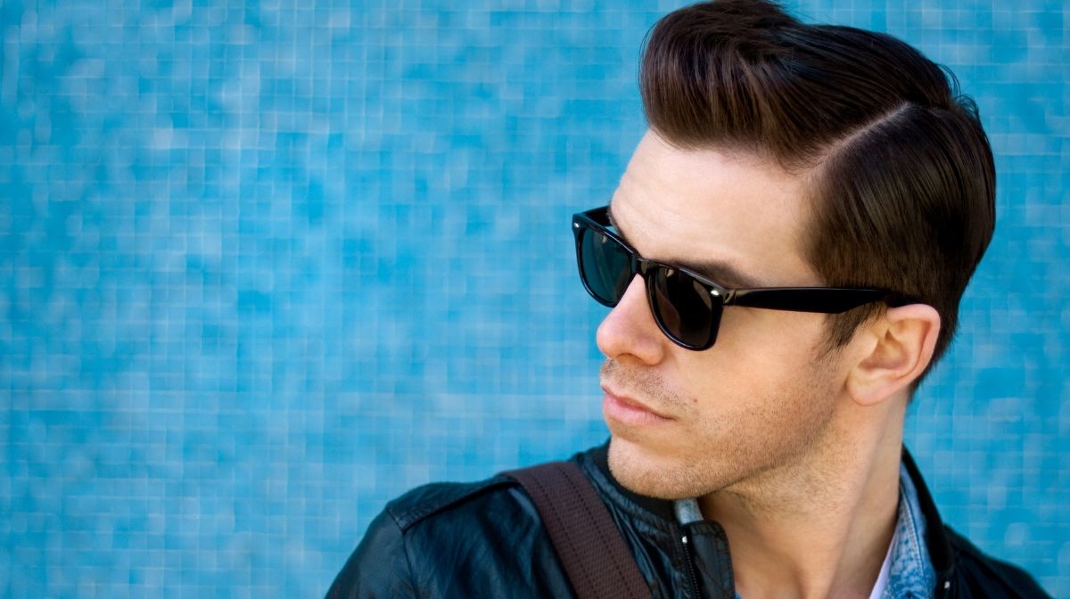 man with a modern comb over to cover a receding hairline