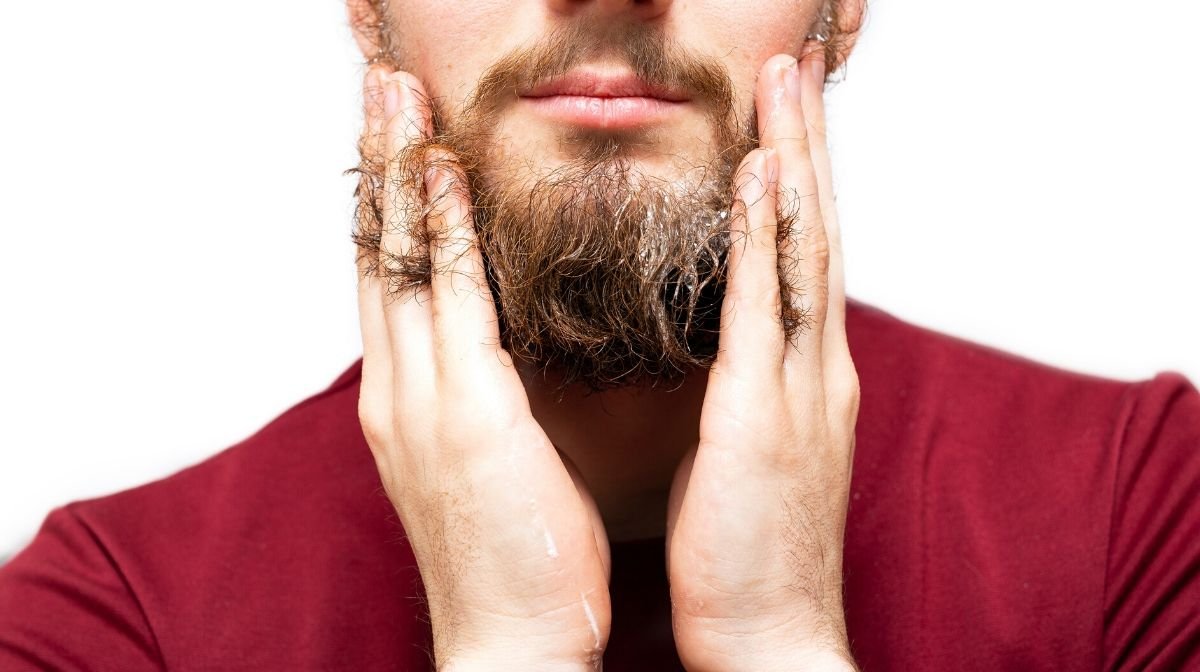 man washing beard
