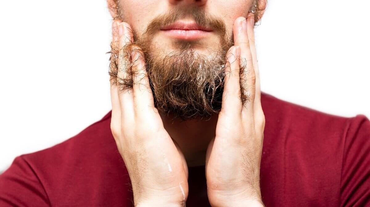 man washing beard