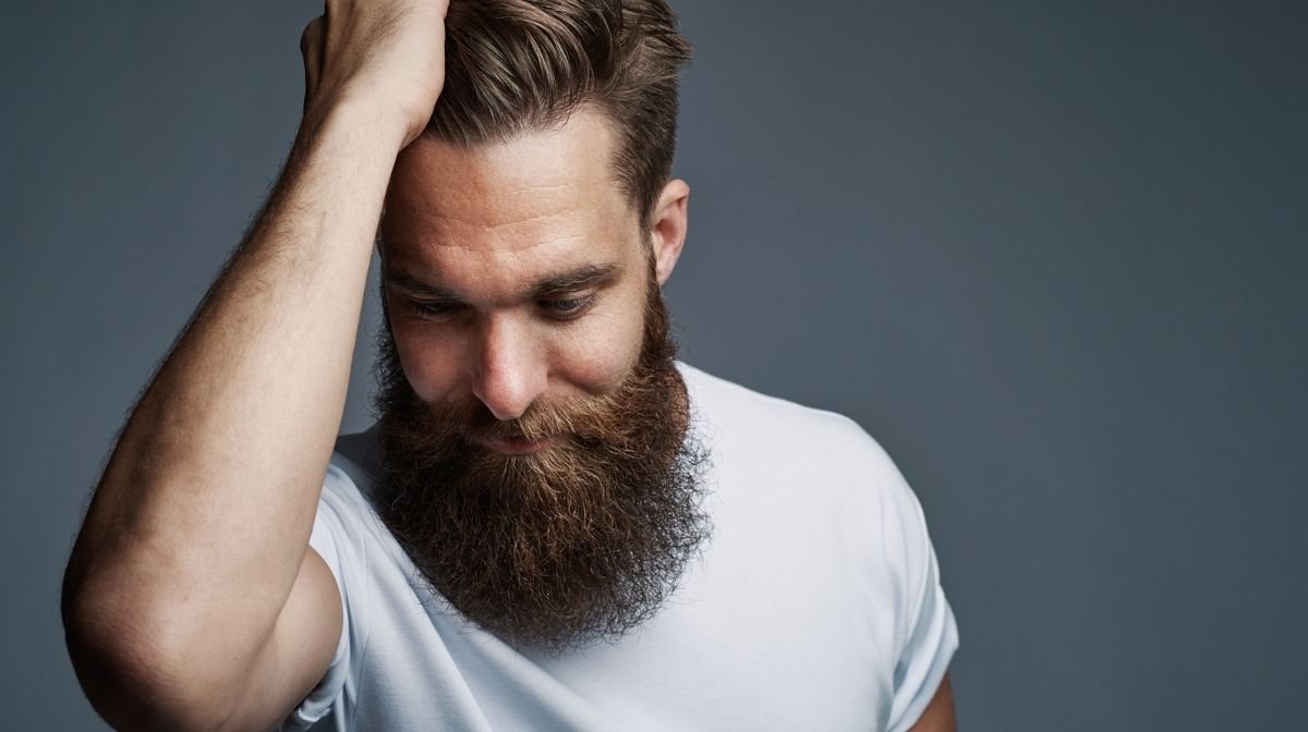 man with a long, well-groomed beard