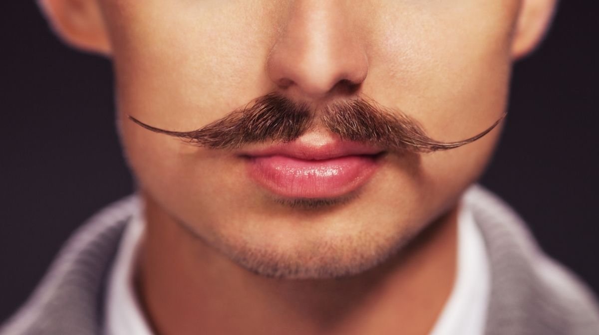 young man with Movember moustache
