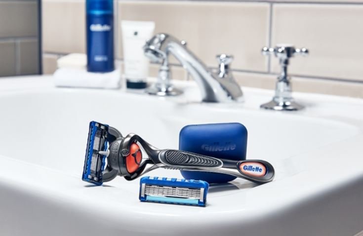 Gillette razors on the side of a sink