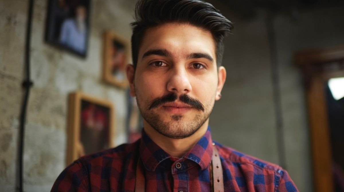 man with a chevron moustache