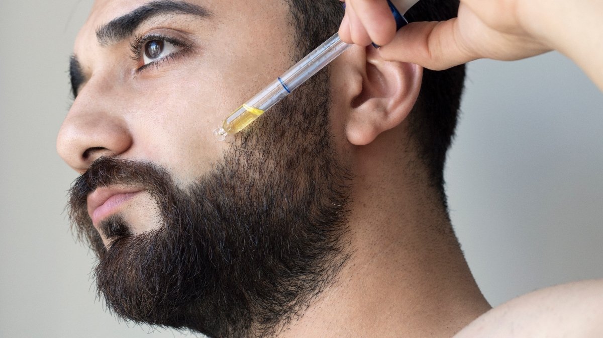 Man using beard softener oil on face | Gillette UK