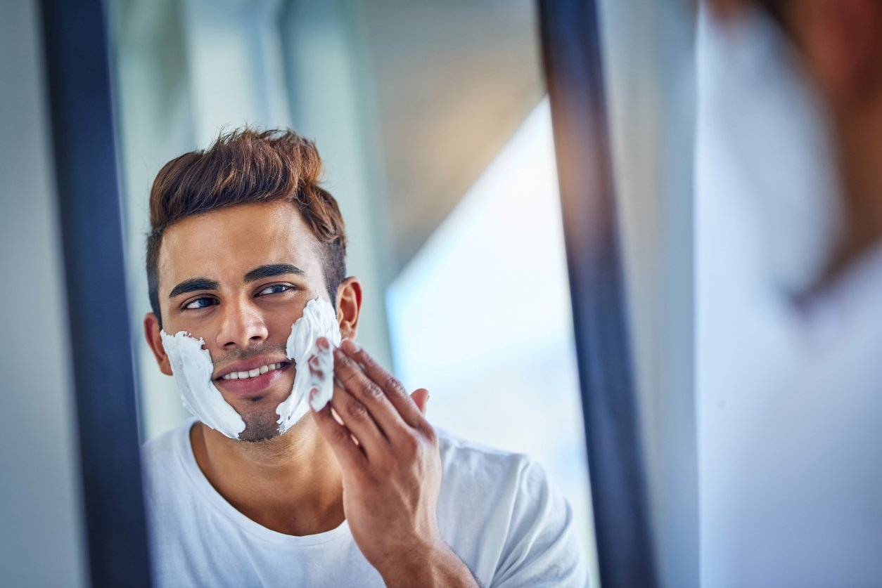A man applies shaving cream to reduce the risk of razor burn | Gillette UK