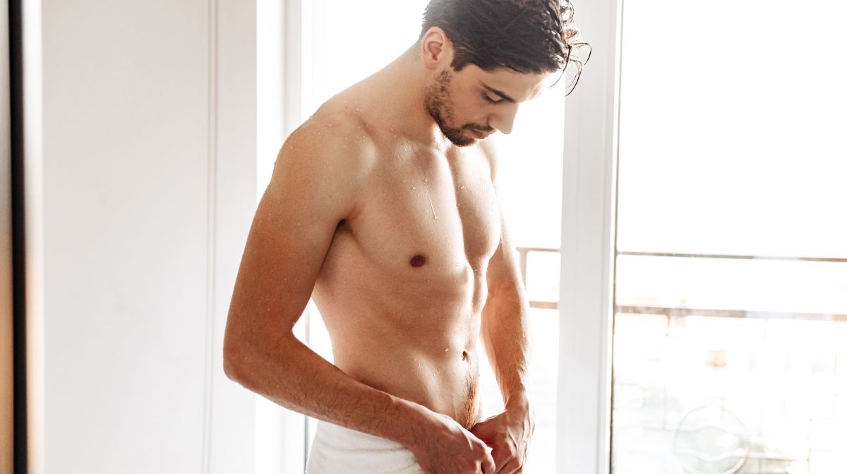 A man in a towel learns how to manscape body hair| Gillette UK