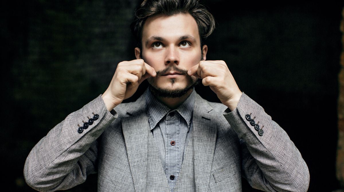 A man twirls his Movember moustache | Gillette UK