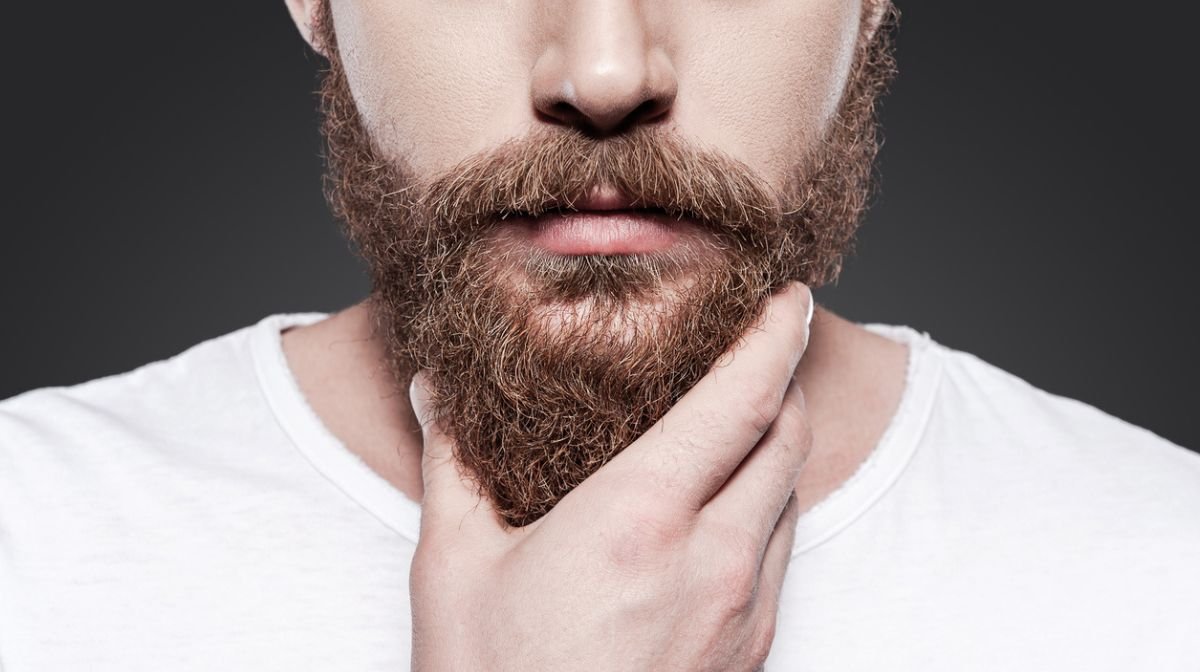 Man touching his stylish beard , styled using Gillette Proglide Styler Beard Trimmer