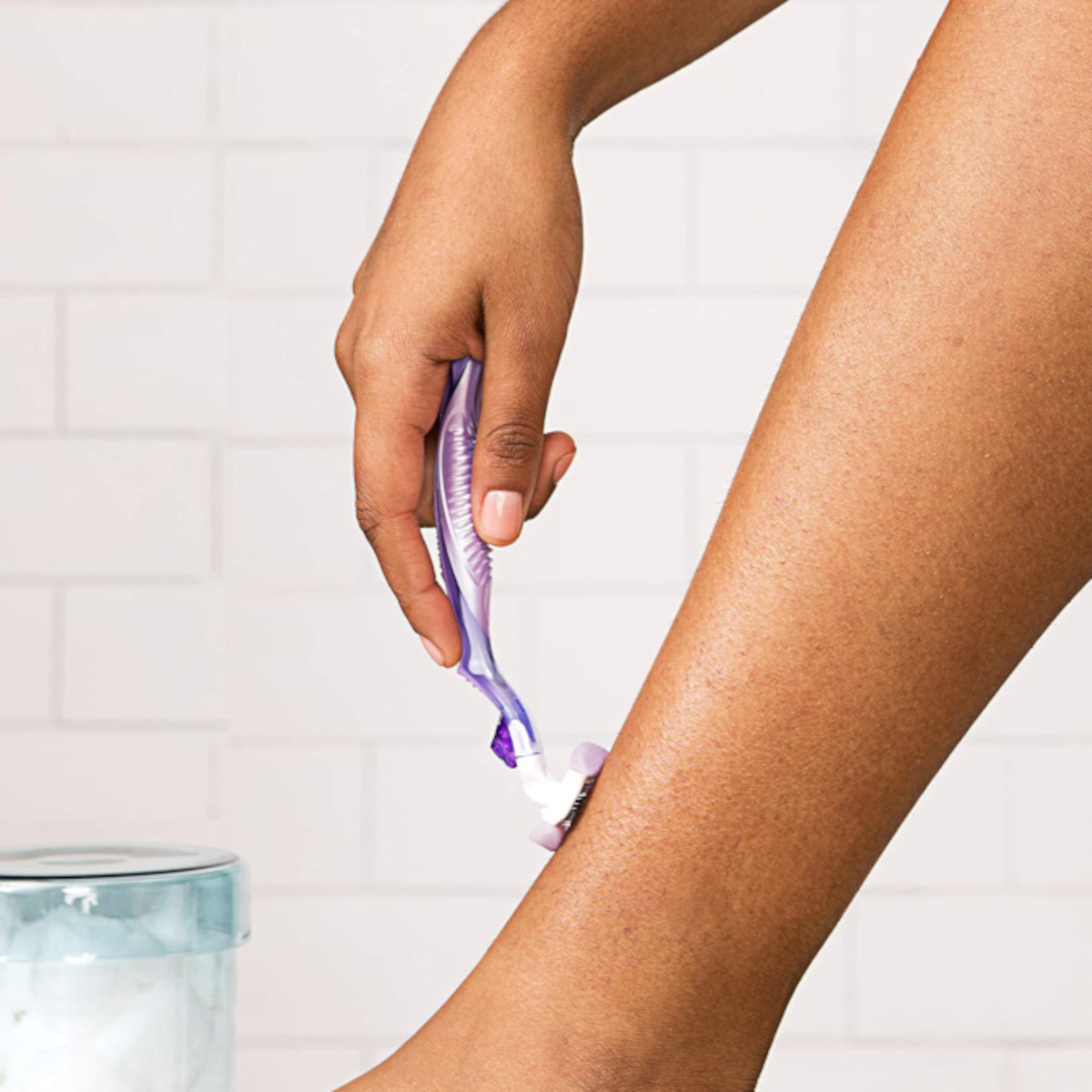 Close up of a woman shaving her leg with a Venus razor | Venus UK