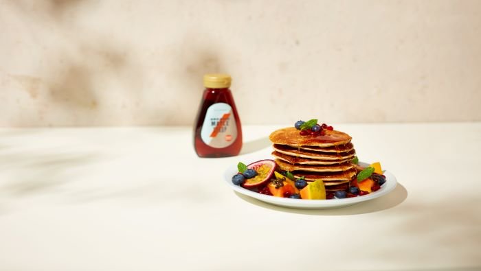 fruit pancakes and maple syrup