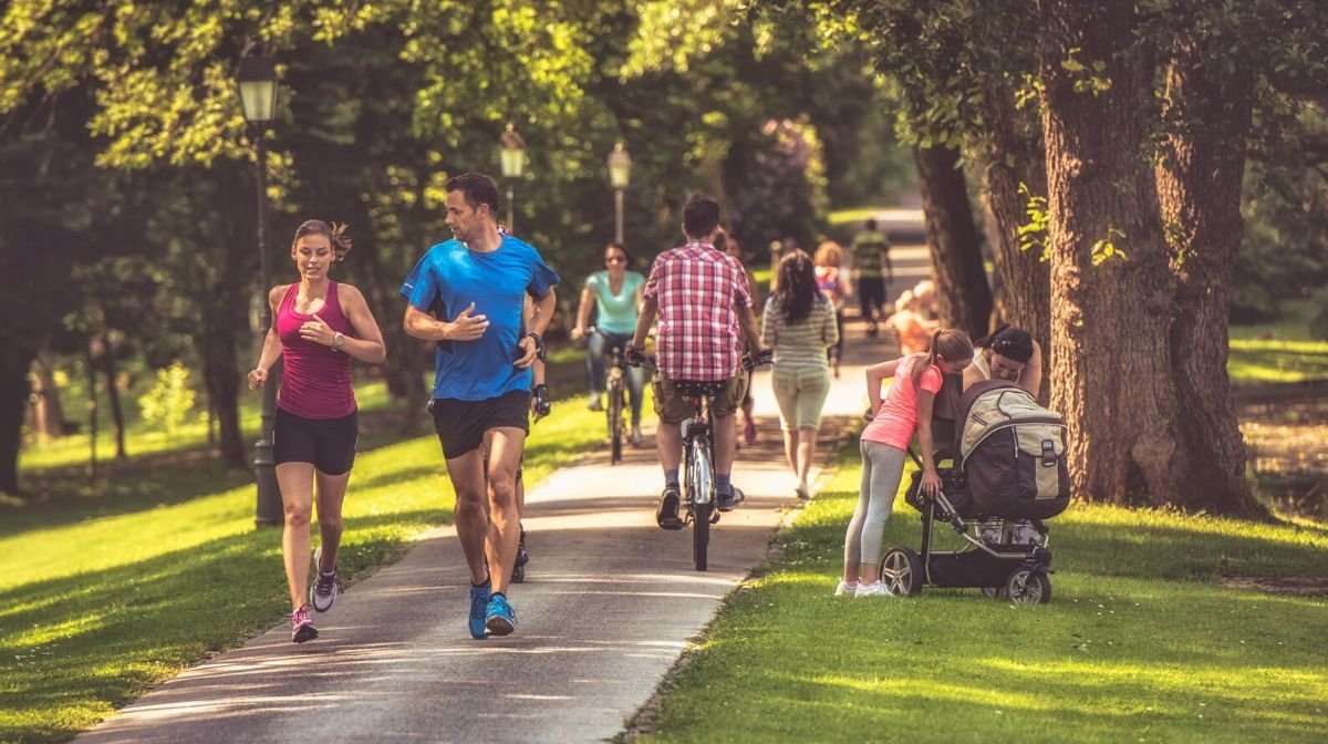 people social distancing while exercising outdoors