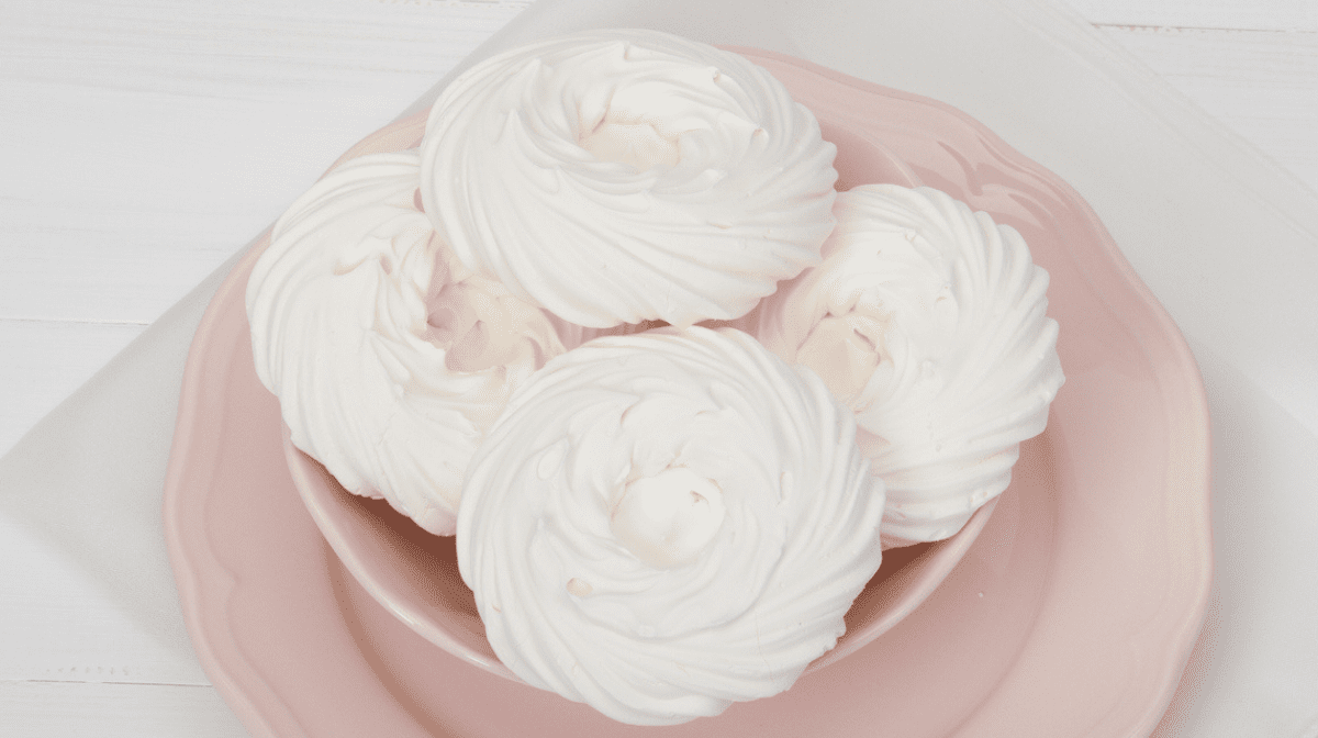 vegan meringue nests in pink bowl