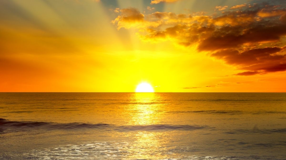 sun rising over the sea