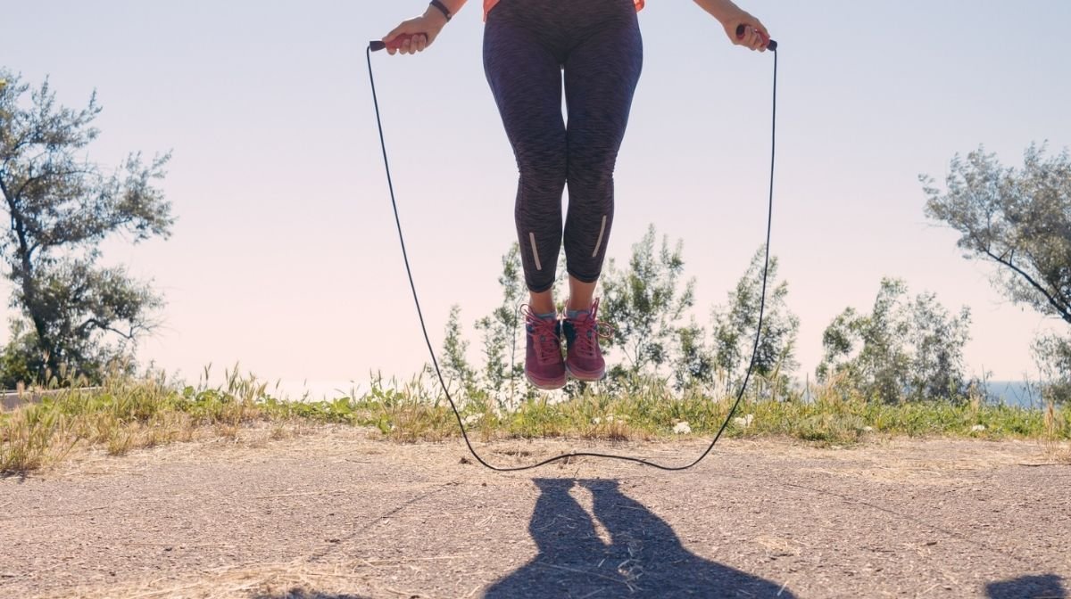 woman skipping outdoors