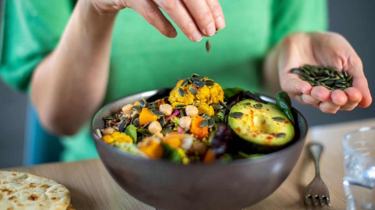 woman preparing vegetarian meal