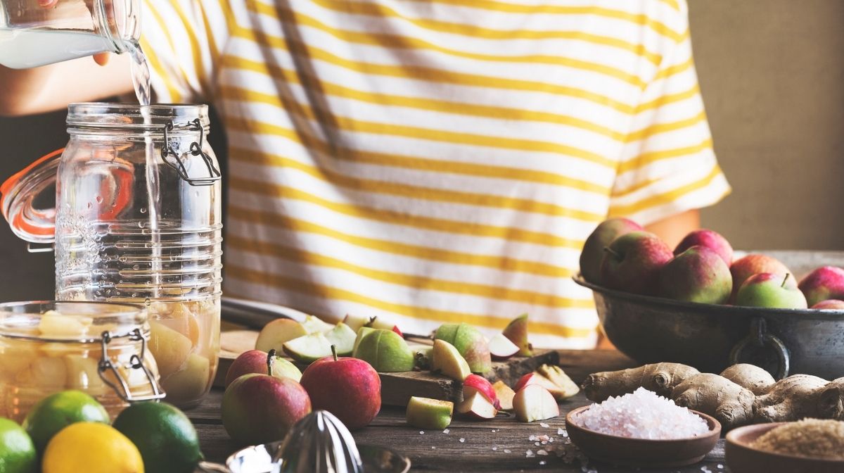 woman making apple cider vinegar