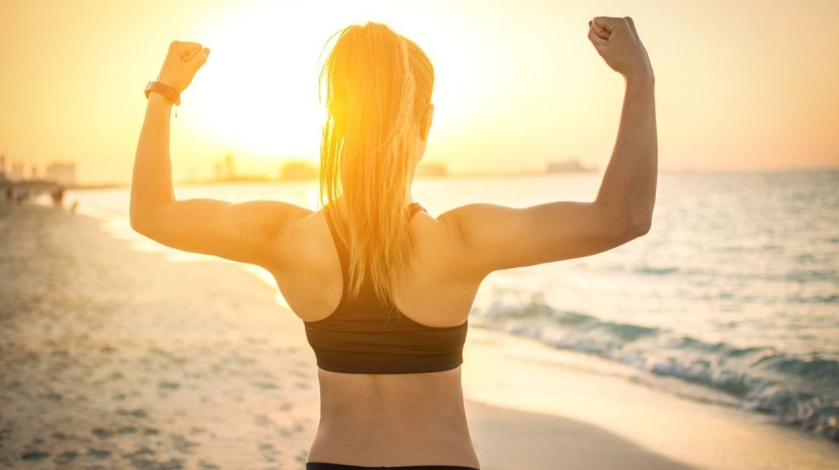 woman flexing muscles