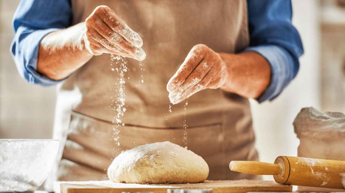 hands preparing vegan dough for pie