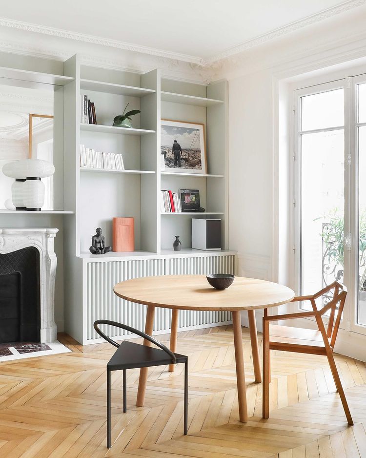 Dining table and chairs with a bookcase